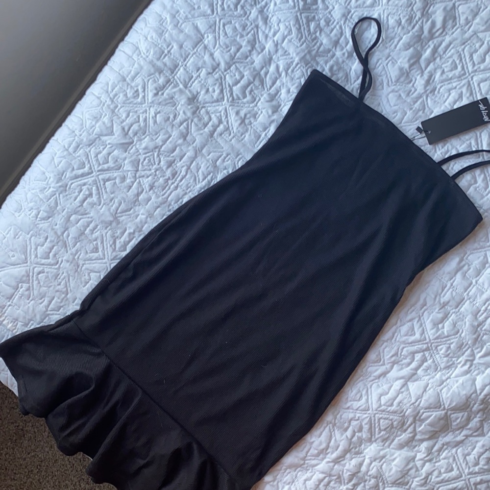 Black bodycon dress with flare hem